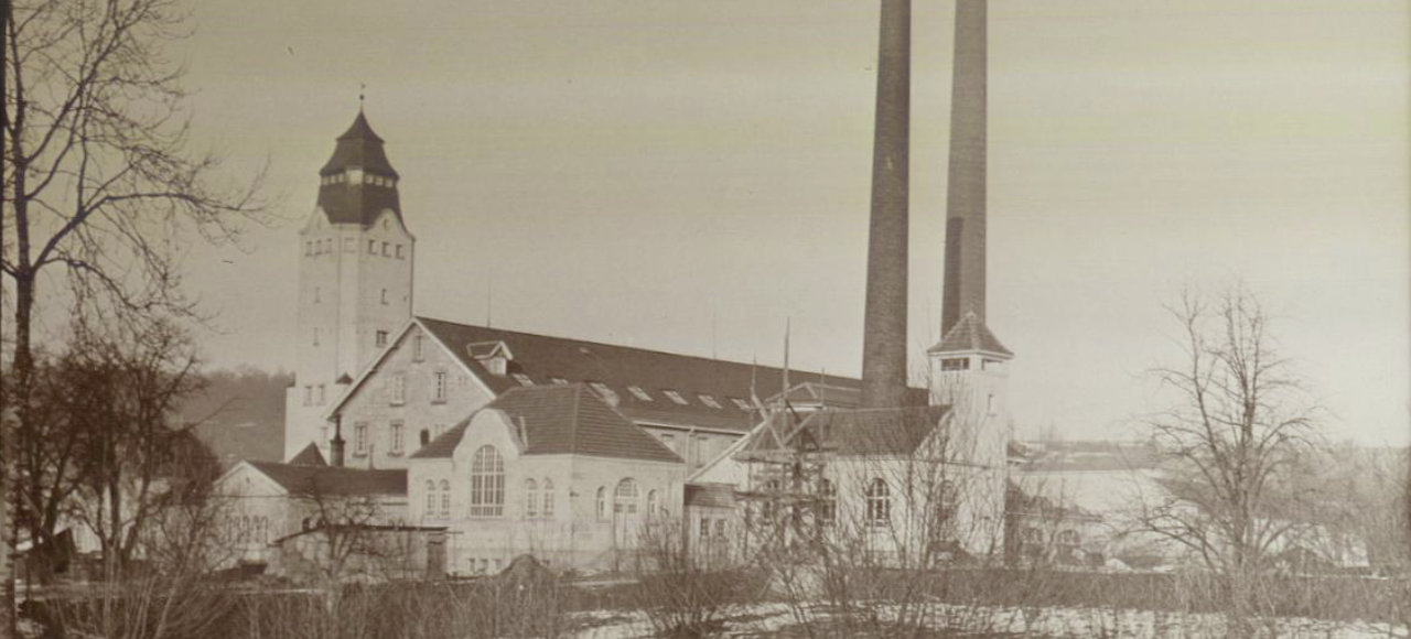 Unternehmensgeschichte Elmer und Zweifel historische Aufnahme um 1910 nach Bau des Wasserturms